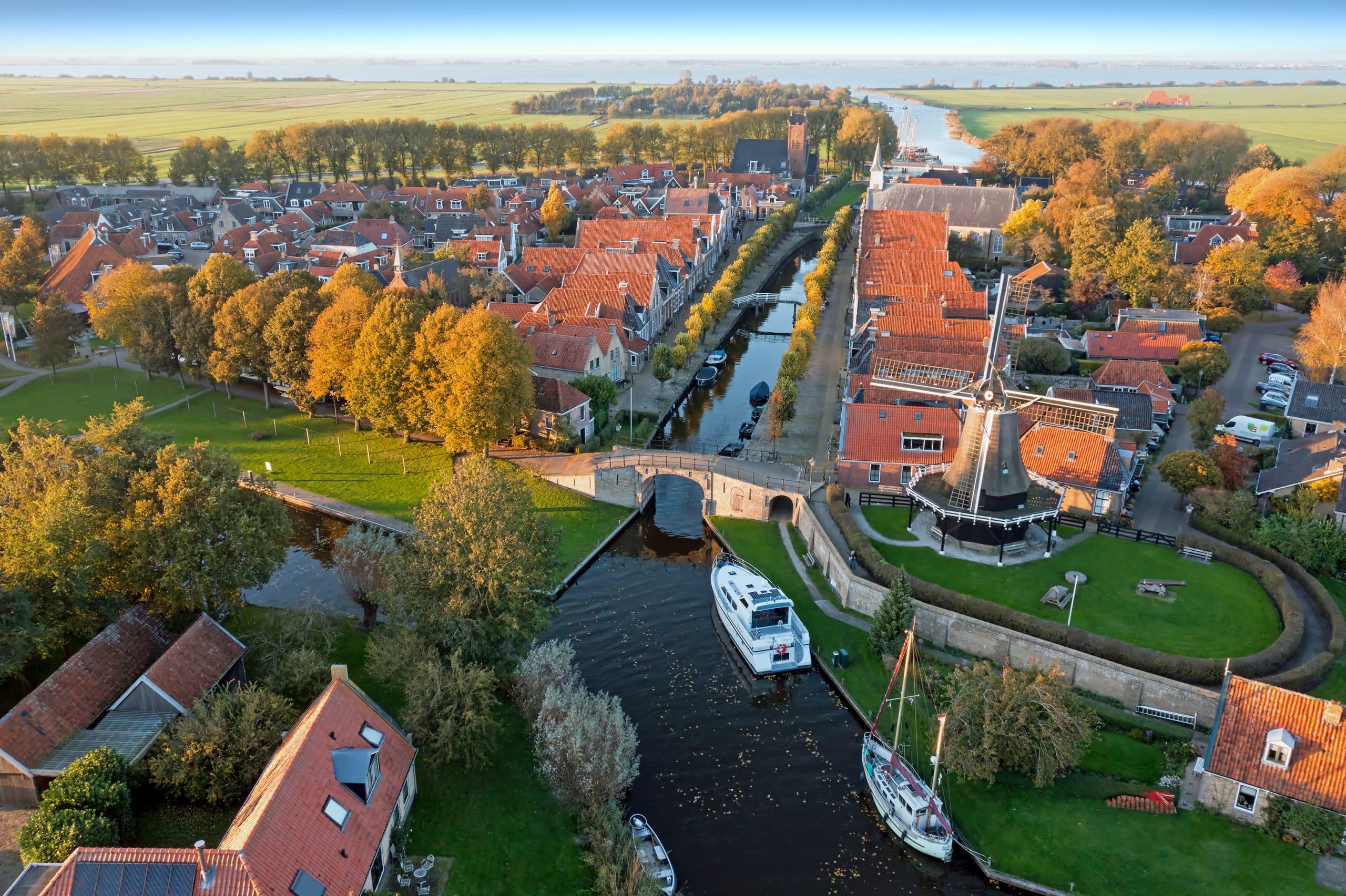 Aerial from the historical village Sloten in Friesland the Netherlands in fall